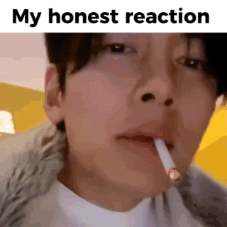 a man is smoking a cigarette in his mouth with a lighter in his mouth .