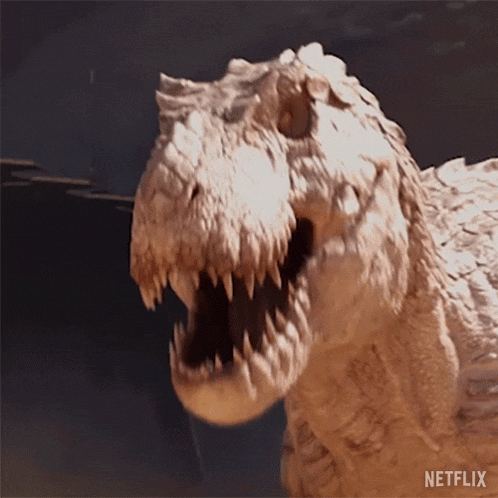 a close up of a dinosaur with its mouth open and the word netflix on the bottom right