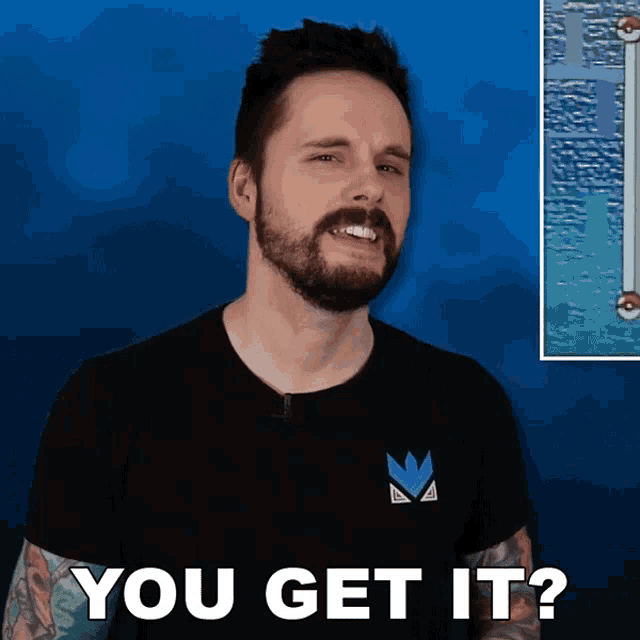 a man with a beard wearing a black shirt says you get it
