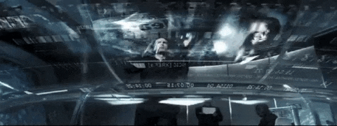 a group of people are standing in front of a screen that says ' x ' at the top