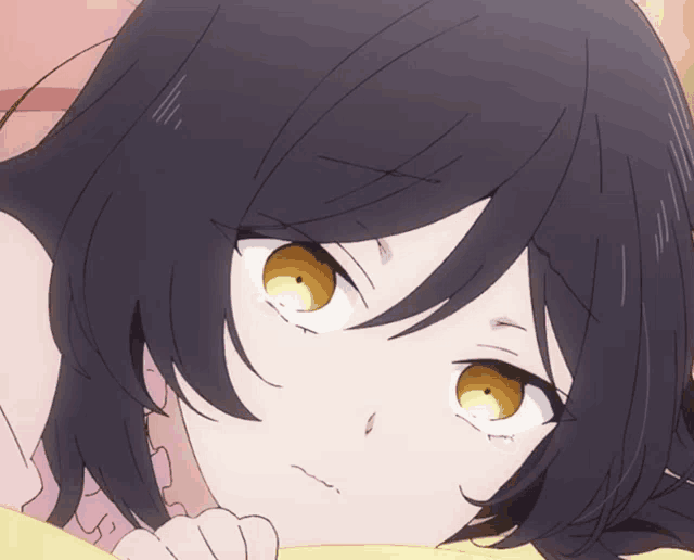 a close up of a girl 's face with a yellow eye