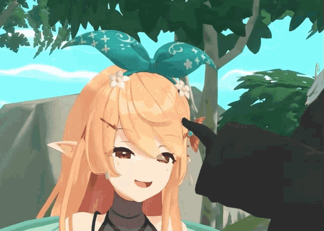 a close up of a girl with a bow on her hair