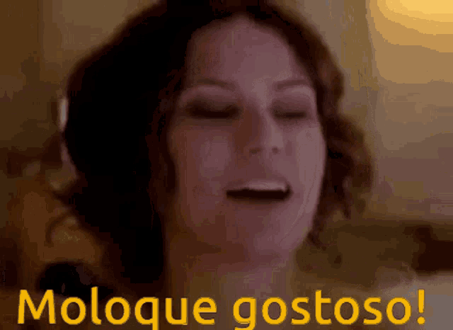 a close up of a woman 's face with the words " moloque gostoso " written in yellow