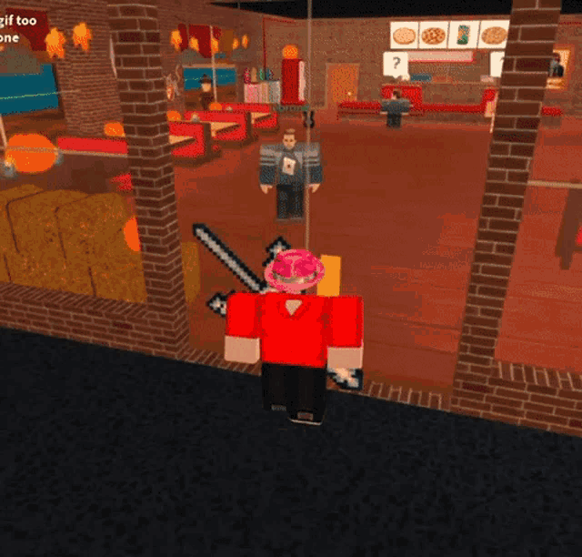 a man in a red shirt is holding a sword in a parking lot with a green van in the background
