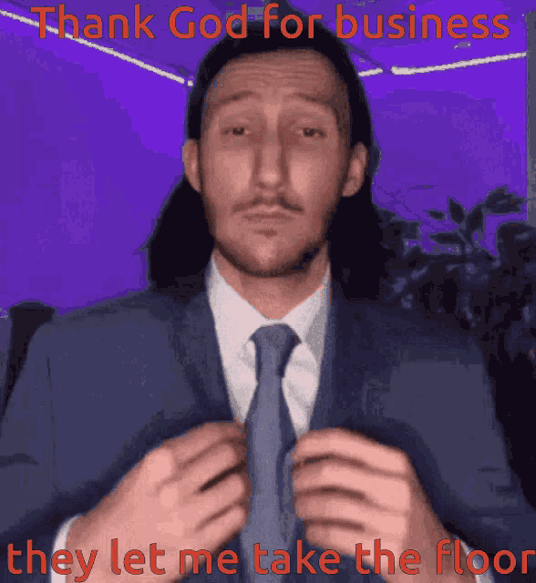 a man in a suit and tie says thank god for business