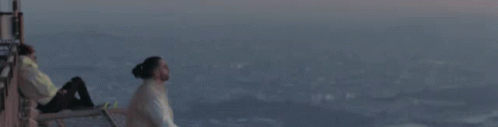 Chilling Sight Seeing GIF - Chilling Sight Seeing Rooftop GIFs