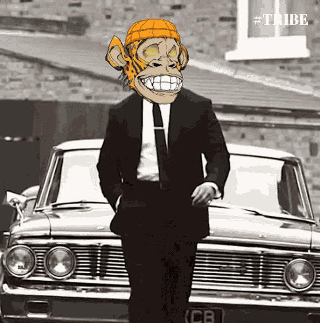 a man in a suit and tie with a monkey mask on his head