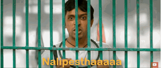a man behind bars with the words nalipesthaaa written in orange