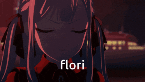 a close up of a girl with the name flori on the bottom right