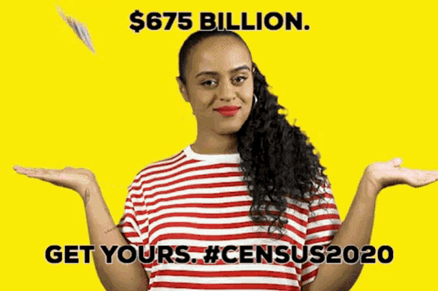 a woman in a red and white striped shirt is holding money in her hands in front of her face .