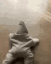 a person is laying on the floor in a star shape .