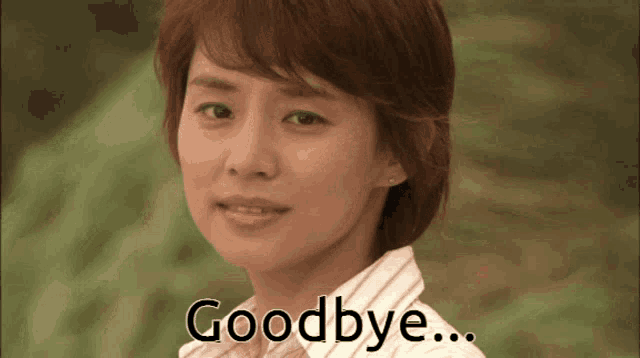 a woman in a striped shirt says goodbye in front of a green background