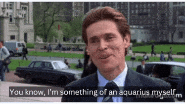 a man in a suit and tie says " you know , i 'm something of an aquarius myself . "