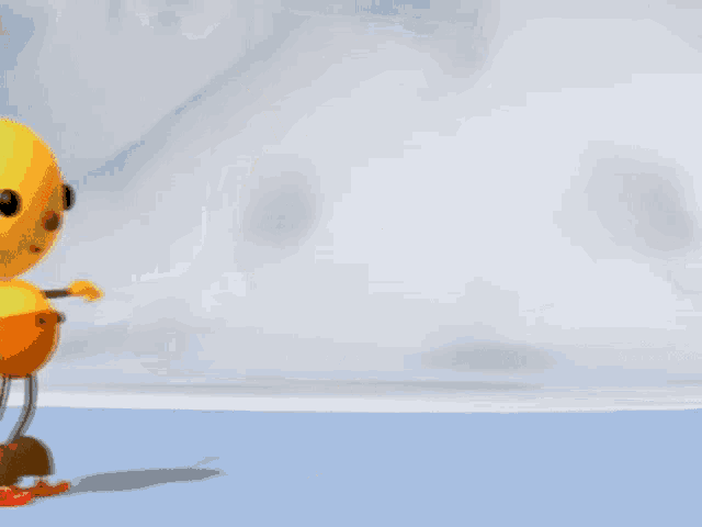 a cartoon character with a yellow head and orange pants is skating on ice