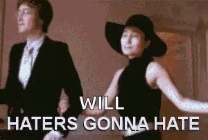 a man and a woman are dancing together with the words `` will haters gonna hate '' .