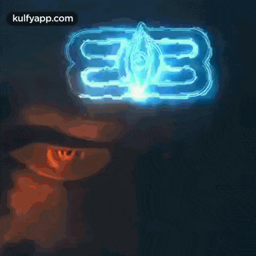 a close up of a person 's face with a blue background and the words kulfyapp.com below it