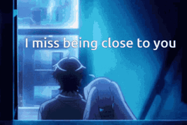 a man and a woman are looking out a window with the words i miss being close to you above them