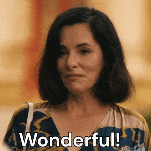 a woman says " wonderful " in front of her