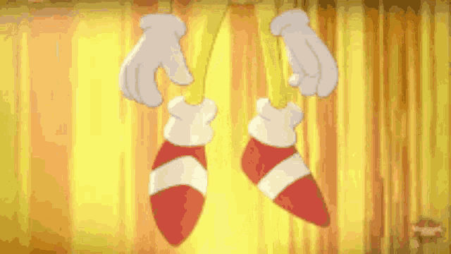 a cartoon of sonic the hedgehog standing in front of a yellow curtain