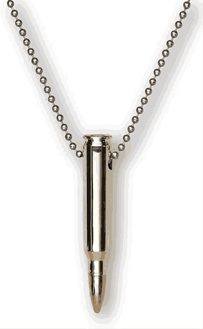 a necklace with a bullet pendant on it