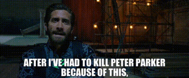 a man with a beard is talking about peter parker .