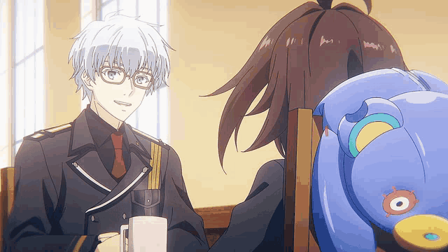 a man and a girl are sitting at a table with a cup of coffee