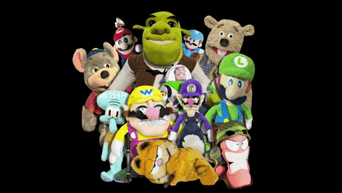 a group of stuffed animals including shrek and mario are gathered together