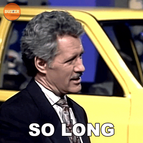 a man in a suit and tie says " so long "