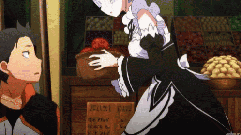 a girl in a maid outfit is standing next to a boy in front of a sign that says fruit cafe
