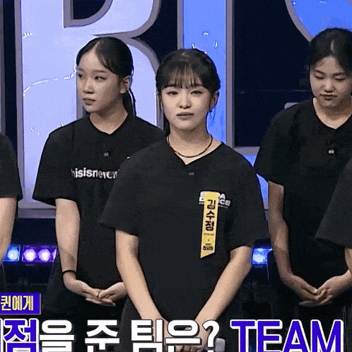 a girl with a name tag that says team