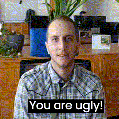 a man in a plaid shirt with the words you are ugly on the bottom
