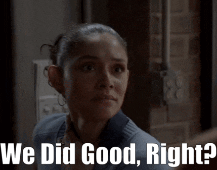 a woman says we did good right in a dark room