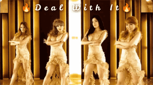 four women are dancing in front of a sign that says deal with it on it
