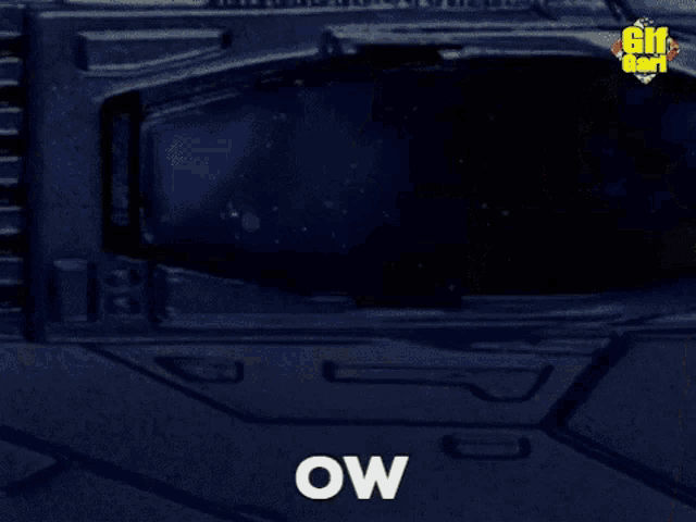 a gif that says ow is being displayed on a dark background