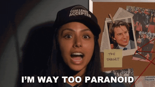 a woman wearing a hat that says challenge accepted stands in front of a bulletin board