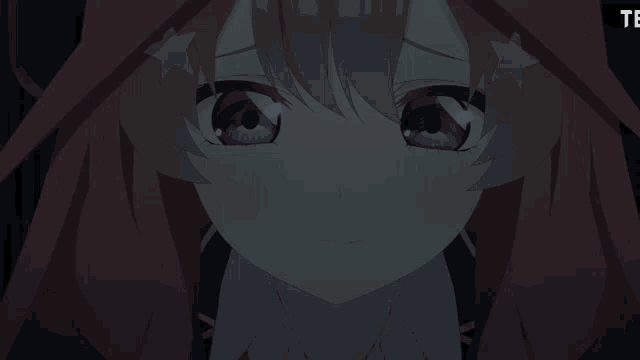 a close up of a girl 's face with the word te on the bottom right