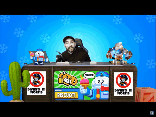 a man sitting at a desk with a sign that says riscuoti on it