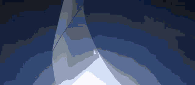 a close up of a person holding a sword in a dark room with a blue light coming out of it .