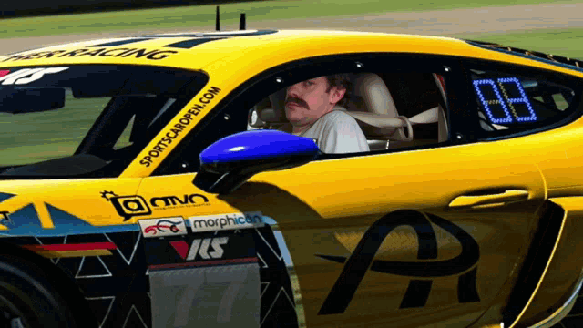 a man is driving a yellow sports car with the number 68 on it