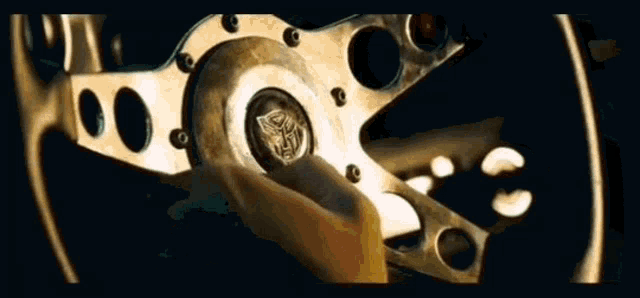 a close up of a steering wheel with the word transformers on it