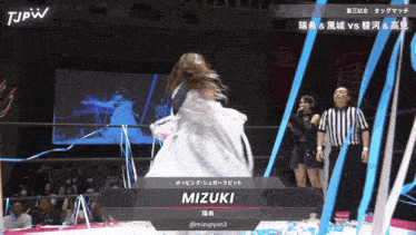 a wrestling match between mizuki and tjpw