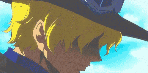 a man with yellow hair is wearing a black hat