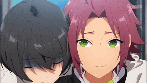 two anime characters are standing next to each other and one of them has a chinese watermark on his head