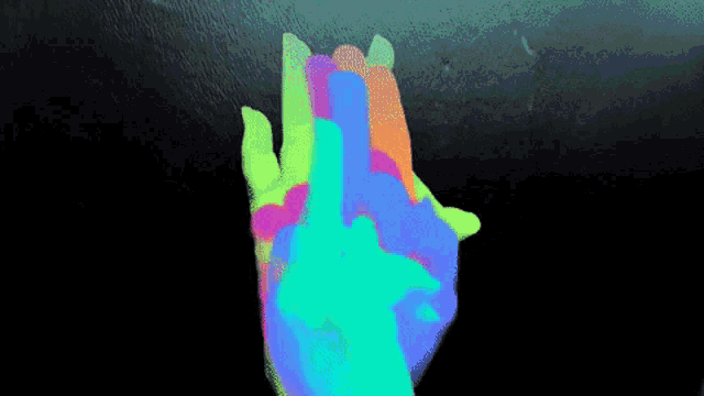 a rainbow colored hand with a black background