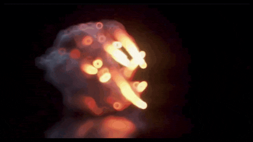 a large explosion with flames and smoke coming out of it