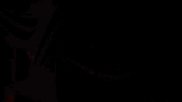 a person walking on a brick floor with a red background