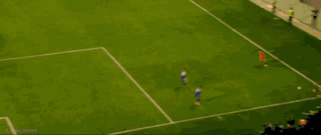 a blurry picture of a soccer field with the name kevin james visible