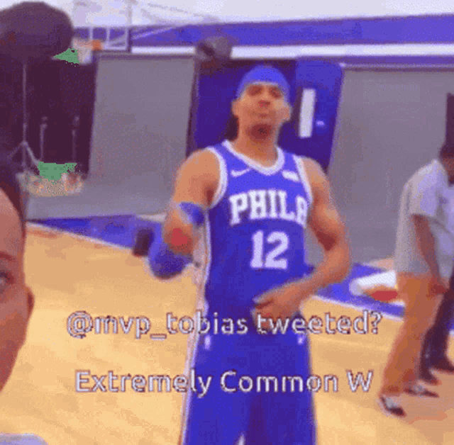 a philadelphia basketball player wearing number 12