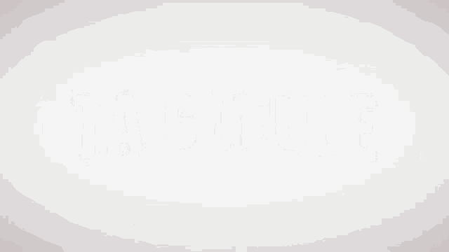 a shadow of the word ta gueule is cast on a white background