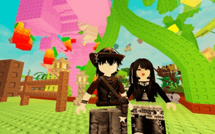 a boy and a girl are standing next to each other in a game